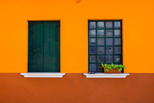 old houses with scraped walls or shoking colours, rusty doors or windows
