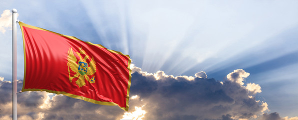 Montenegro flag on blue sky. 3d illustration