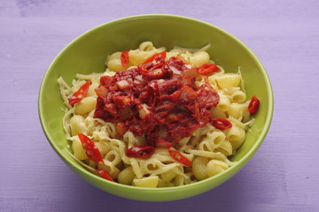 pasta with tomato paste, cheese and Chile pepper