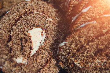 Delicious sweet roll with cream close-up. Cookies.