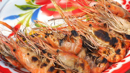 Giant freshwater prawn ready to eat serve in vintage tray