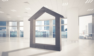 Conceptual background image of concrete home sign in modern offi
