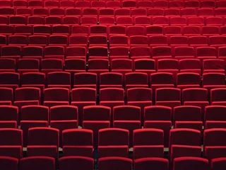 Fototapete Theater Reihen von roten Sesseln in einer Aufführungshalle