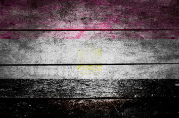 Obraz premium wooden texture surface with old painted flag