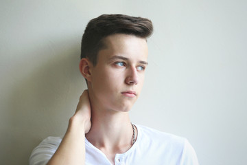 Young fashion style men on a grey