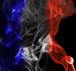 Obraz premium Flaga narodowa Francji dymu