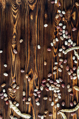 Beans on a wooden background are full of protein and vitamins