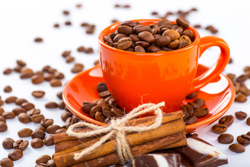 Coffee cup and beans on a white background.