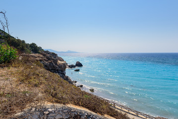Coastline of Rhodes island with blue transparent water