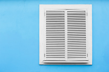 Window with blue background wall