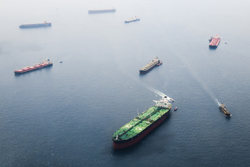 Big tanker with two helicopter platforms stay on anchor - 175136109