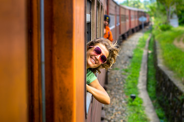 Young woman traveling by train