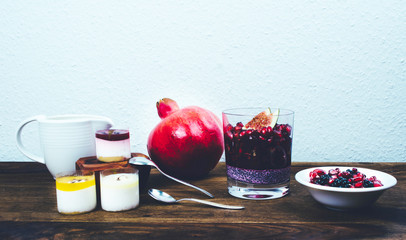 Healthy breakfast set on rustic wooden table.