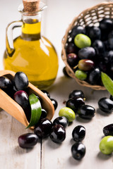 Olives And Olive Oil In a Bottle