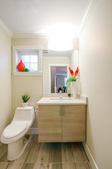 Interior design of a cozy bathroom in a house hotel.