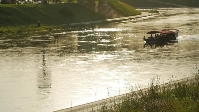 Canal scene with narrowboat at the sunset.