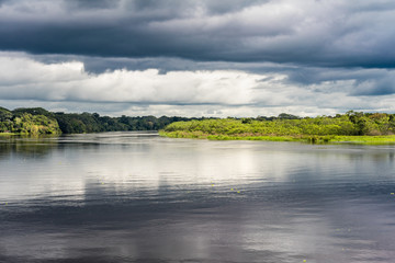 Stormy skys rolling in at the confluence of the Amazon river