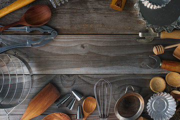 various kitchen utensils on rustic wooden table