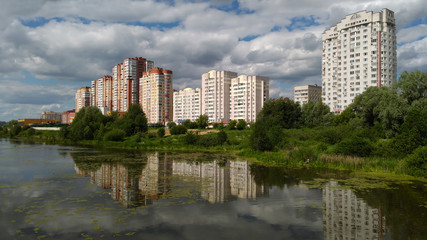 Fototapeta na wymiar New residential district on the bank of the river Pekhorka. Balashikha, Moscow region, Russia