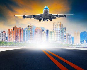 passenger plane arrival and approach for landing to city airport ,for traveling business theme