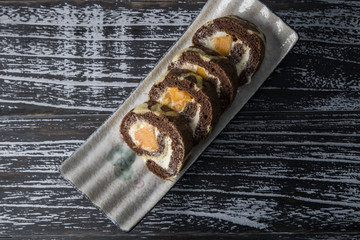 Mango cocoa cake roll