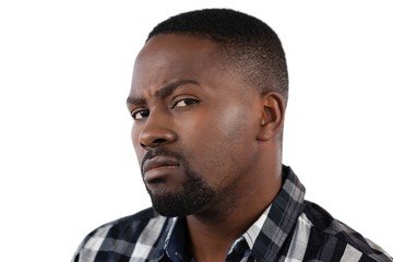 Obraz premium Confused man against white background