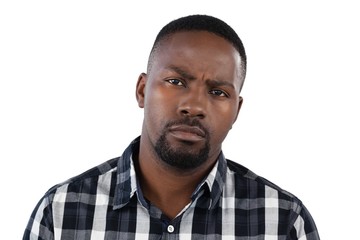 Obraz premium Confused man against white background