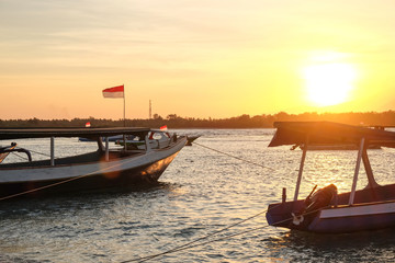 Beautiful sunrise at Gili Travangan island's port