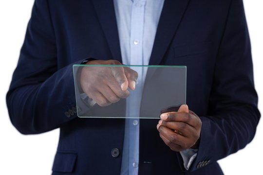 Businessman using a glass digital tablet - Powered by Adobe