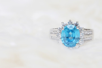 diamond ring and blue gemstone