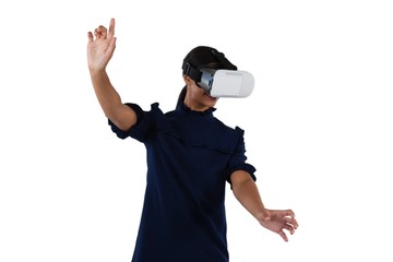 Woman gesturing while using virtual reality headset