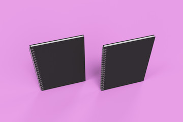 Two notebooks with spiral bound on violet background