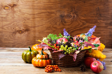 Fall wicker basket table centerpiece with blue flowers