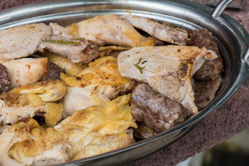 Cooked tasty mixed grilled meat