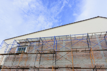 Temporary structure with roof on blue sky background