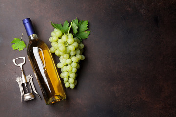Wine bottle and grapes