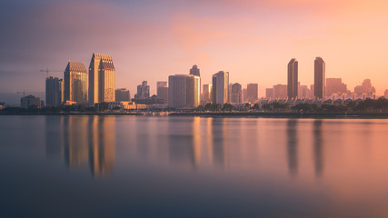 Fototapeta na wymiar Colorful sunrise covers downtown San Diego