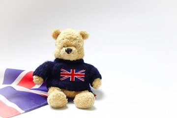 Bear tourist in London on white background