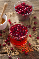 cranberry drink on wooden surface