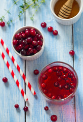 cranberry drink on wooden surface
