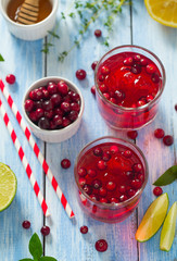 cranberry drink on wooden surface