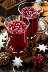 Christmas drink hot cranberry tea and cookies, vertical