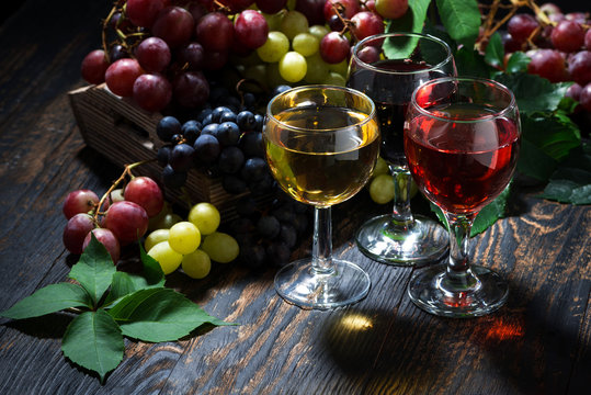assortment of wine on wooden table, top view