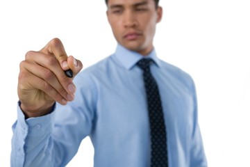 Businessman writing with stylus on interface screen