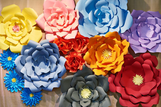 Paper colorful flowers as background