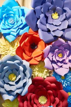 Paper colorful flowers as background