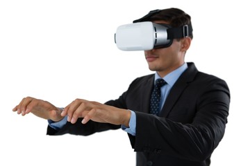 Young businessman gesturing while wearing vr glasses