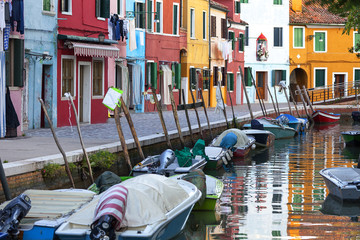 Fototapeta na wymiar Colorful small, brightly painted houses on the island of Burano, Venice, Italy