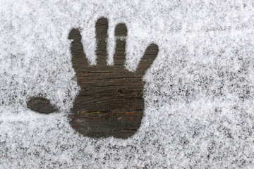 Handprint on the snow