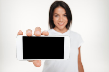 Close up portrait of a smiling brunette woman